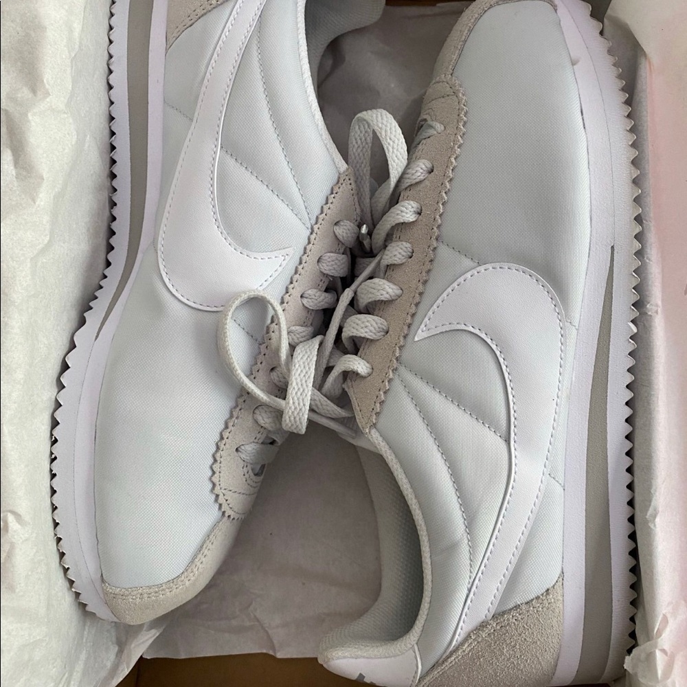 Light grey and nude Nike Cortez worn once!